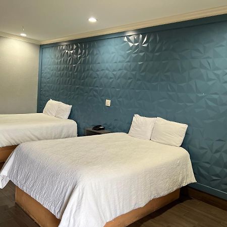 The Symphony Inn & Suites Houston Bagian luar foto