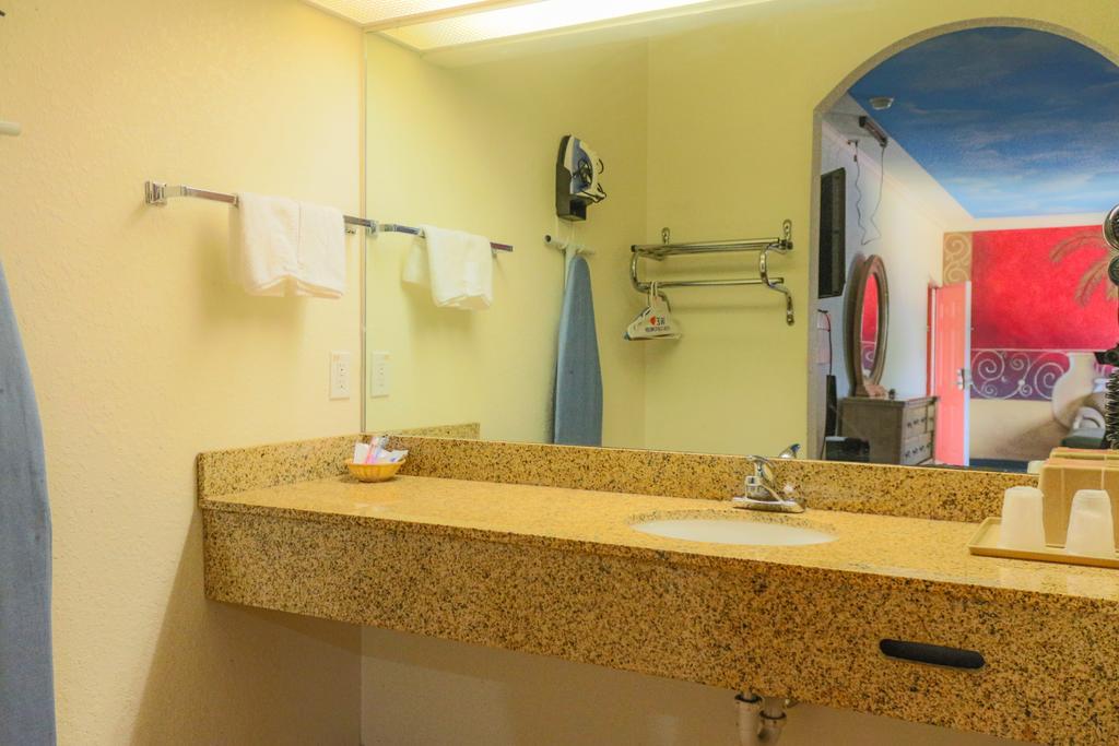 The Symphony Inn & Suites Houston Ruang foto