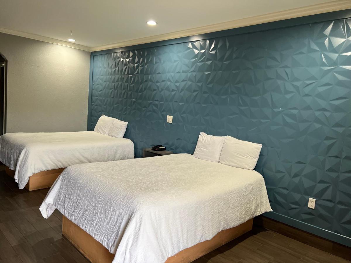 The Symphony Inn & Suites Houston Bagian luar foto